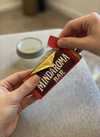 Manos abriendo MINDAROMA BAR